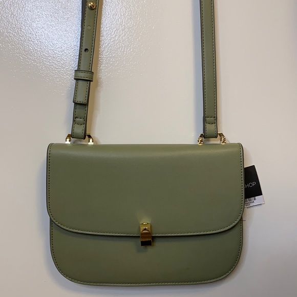 Topshop Handbags - Green over the shoulder long strap Topshop bag.
